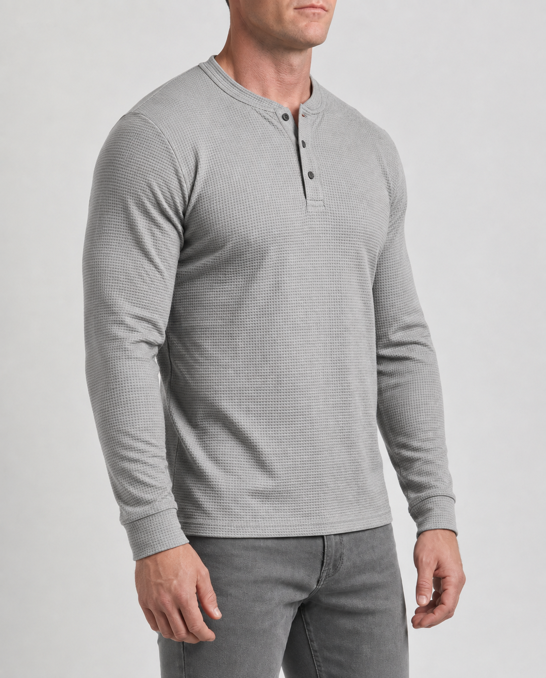 Atlas Waffle Henley in heather grey, three-quarter angle showing waffle texture