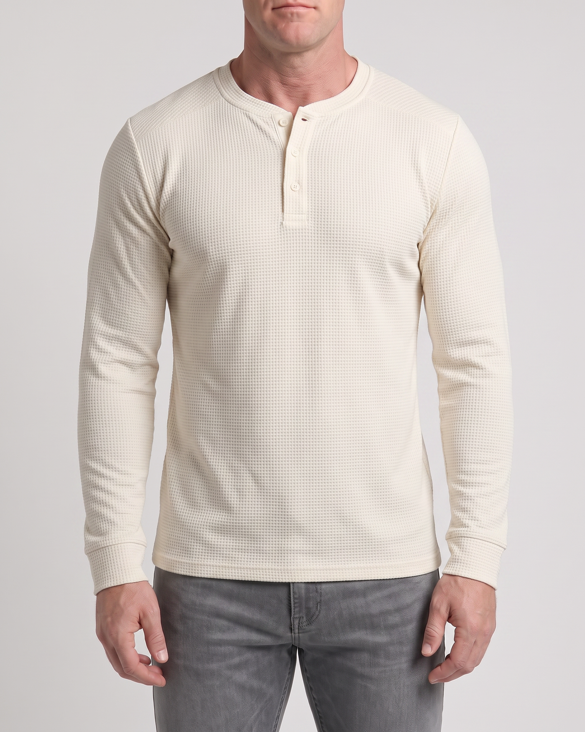 Atlas Waffle Henley in off-white, three-quarter angle on model